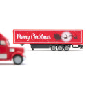 Camión navideño Freightliner SIKU escala 1:87 rojo con detalles cromados y motivos festivos de colección