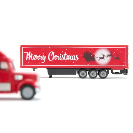 Camión navideño Freightliner SIKU escala 1:87 rojo con detalles cromados y motivos festivos de colección