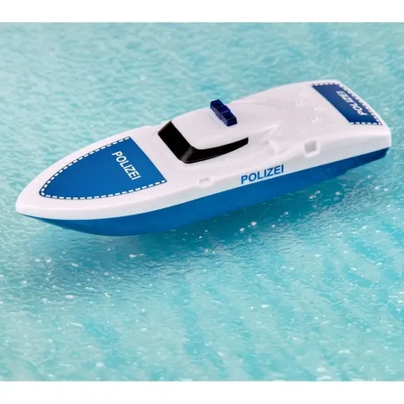 Camión Volvo de juguete con remolque y barco Siku de metal y plástico resistente