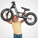 Bicicleta infantil BERG Bike Cross gris con freno de mano de alta precisión y diseño ergonómico ajustable.