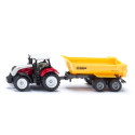 Tractor de juguete Steyr con remolque Krampe SIKU a escala de metal y plástico.