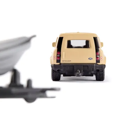 Land Rover Defender “Safari” de siku con barco