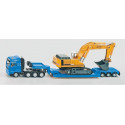 Excavadora de juguete Liebherr a escala 1:87 con chasis de orugas, pala y brazo móvil de metal y plástico.