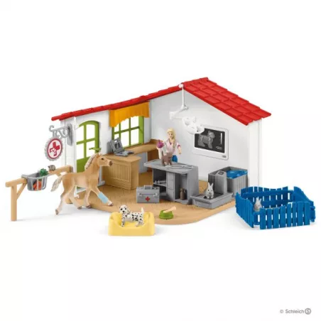Clínica veterinaria de juguete Schleich Farm World con figuras de animales y accesorios médicos.