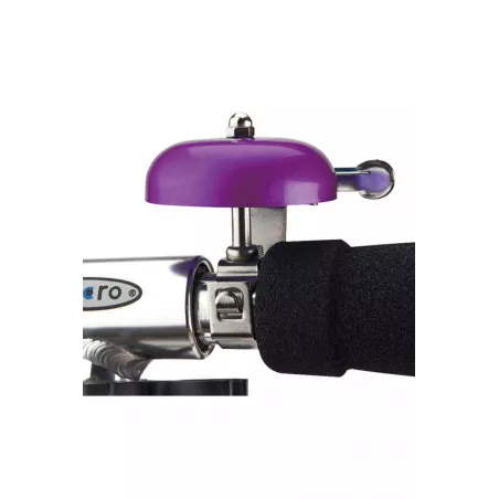 Timbre de bicicleta metálico color lila de diseño moderno y resistente para ciclismo urbano.