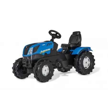 Tractor a pedales New Holland T7 azul para niños de 3 a 8 años con capó abatible y ruedas robustas.
