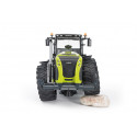 Tractor de juguete Claas Xerion 5000 de Bruder a escala 1:16 con cabina giratoria y neumáticos perfilados.
