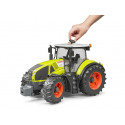 Tractor de juguete Claas Axion 950 de Bruder a escala 1:16 con capó y puertas practicables.