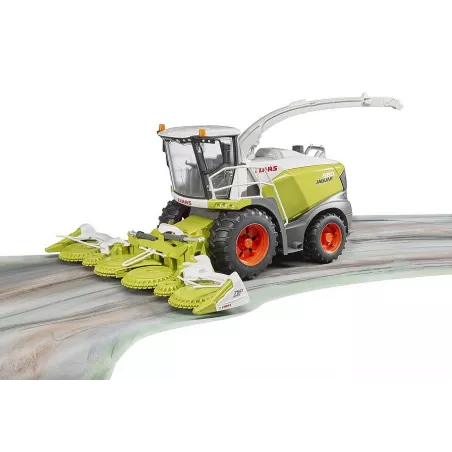 Cosechadora de juguete Claas Jaguar 980 a escala 1:16 con cabina transparente y cabezal de recogida.