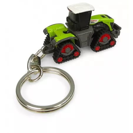Llavero metálico del tractor Claas Xerion 5000 Trac con detalles de orugas y diseño robusto.