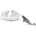Tobogán de osos polares Schleich con figuras de oseznos y narval de juguete sobre témpano de hielo.