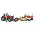 Tractor de juguete Massey Ferguson 7480 con pala cargadora frontal y remolque rojo a escala 1:16.