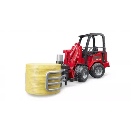 Cargadora articulada Schäffer Hoflader 2034 de Bruder a escala 1:16 con pinza funcional para pacas de heno.