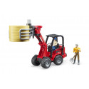 Cargadora articulada Schäffer Hoflader 2034 de Bruder a escala 1:16 con pinza funcional para pacas de heno.