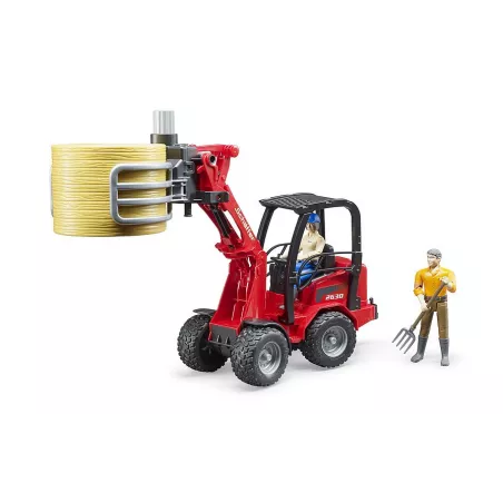 Cargadora articulada Schäffer Hoflader 2034 de Bruder a escala 1:16 con pinza funcional para pacas de heno.