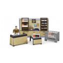 Tienda de paquetería UPS bworld de Bruder a escala 1:16 con figura de empleado, mostrador, báscula y paquetes.