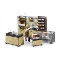 Tienda de paquetería UPS bworld de Bruder a escala 1:16 con figura de empleado, mostrador, báscula y paquetes.