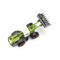 Cargadora de ruedas Claas Torion 1914 de juguete en miniatura de metal y plástico.
