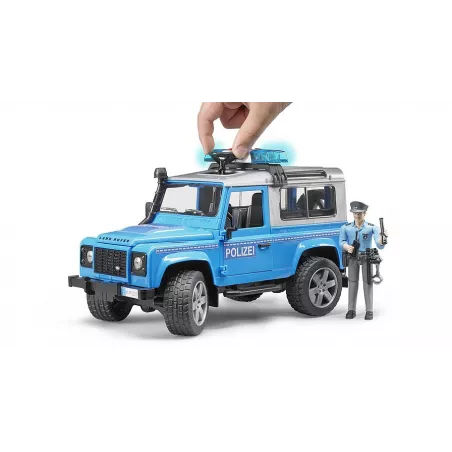 Land Rover de policía de juguete Bruder a escala 1:16 con figura de agente.