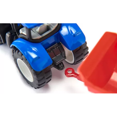 Tractor de juguete New Holland con horquilla delantera, miniatura de metal y plástico resistente.