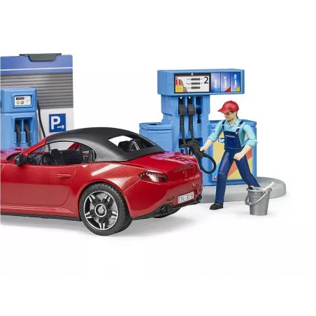 Estación de servicio de juguete Bruder con coche descapotable, gasolinera y túnel de lavado a escala 1:16.