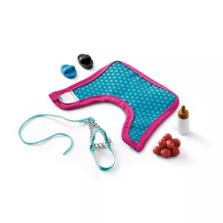 Set de juego de cuidado de potros con potrillo de juguete y accesorios de alimentación y limpieza.