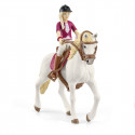 Figura de Sofia con su yegua andaluza Blossom, silla de montar y brida de Schleich Horse Club.