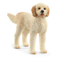 Figura de juguete de perro Goldendoodle de Schleich con pelaje rizado realista para niños y coleccionistas.