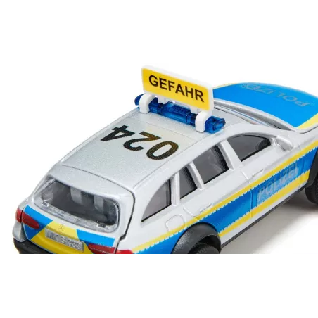 Coche de policía de juguete Mercedes-Benz Clase E Todo Terreno 4x4 a escala 1:50 con puertas abatibles.