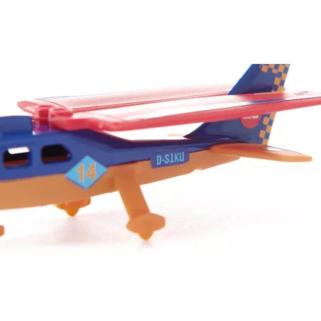 Avión deportivo de juguete fabricado en metal y plástico con detalles realistas.