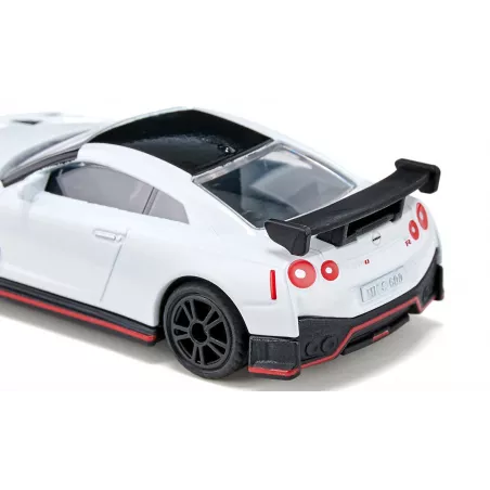 Coche de juguete Nissan GT-R Nismo en miniatura de metal y plástico resistente.