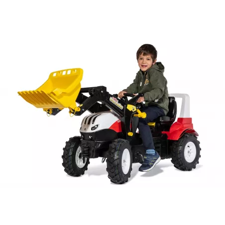 Tractor de pedales infantil Steyr 6300 Terrus CVT con pala cargadora delantera para niños de 3 a 8 años.