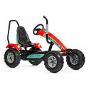 Tractor de pedales Massey Ferguson con barra antivuelco y estructura metálica para niños.