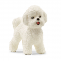 Figura de juguete de Bichón Frisé de Schleich con pelaje esponjoso realista.