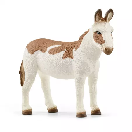 Figura de juguete de burro americano moteado Schleich con crin bicolor y detalles realistas pintados a mano.