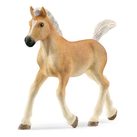 Figura de juguete de potro Haflinger de Schleich con pelaje crema y crin blanca