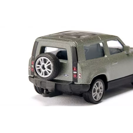 Miniatura Land Rover Defender 90 P400 verde Pangea de metal con techo acristalado y rueda de repuesto.