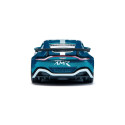 Miniatura de Aston Martin Vantage GT4 azul metálico con alerón trasero y llantas deportivas de competición.