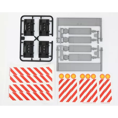 Conjunto de barreras de obra de juguete Bruder para delimitar zonas de construcción.