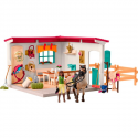 Set de juguete Guadarnés de Schleich con accesorios detallados para establo de caballos.