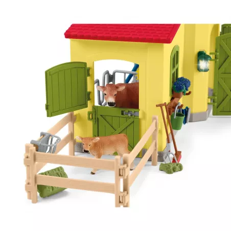 Establo de juguete grande con figuras de animales, granjero Paul y accesorios de granja.