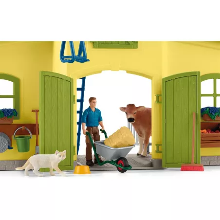 Establo de juguete grande con figuras de animales, granjero Paul y accesorios de granja.