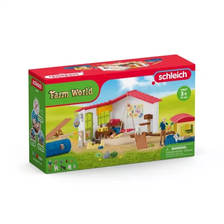Set de juego hotel de animales Schleich con figuras de mascotas y circuito de agilidad.