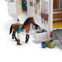 Autocaravana de juguete con zona para caballos, tres figuras de caballos, personajes y accesorios.