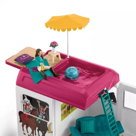 Autocaravana de juguete con zona para caballos, tres figuras de caballos, personajes y accesorios.