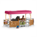 Autocaravana de juguete con zona para caballos, tres figuras de caballos, personajes y accesorios.