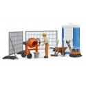 Set de obra bworld de BRUDER con figura articulada, vallas de seguridad y herramientas de juguete.
