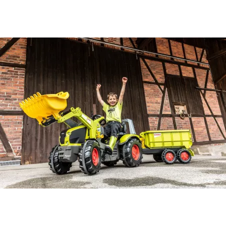 Tractor de pedales Claas Axion 950 para niños con cargador frontal y asiento ajustable.