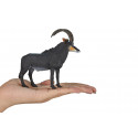 Figura decorativa realista de antílope sable esculpida con detalle para coleccionistas de fauna.